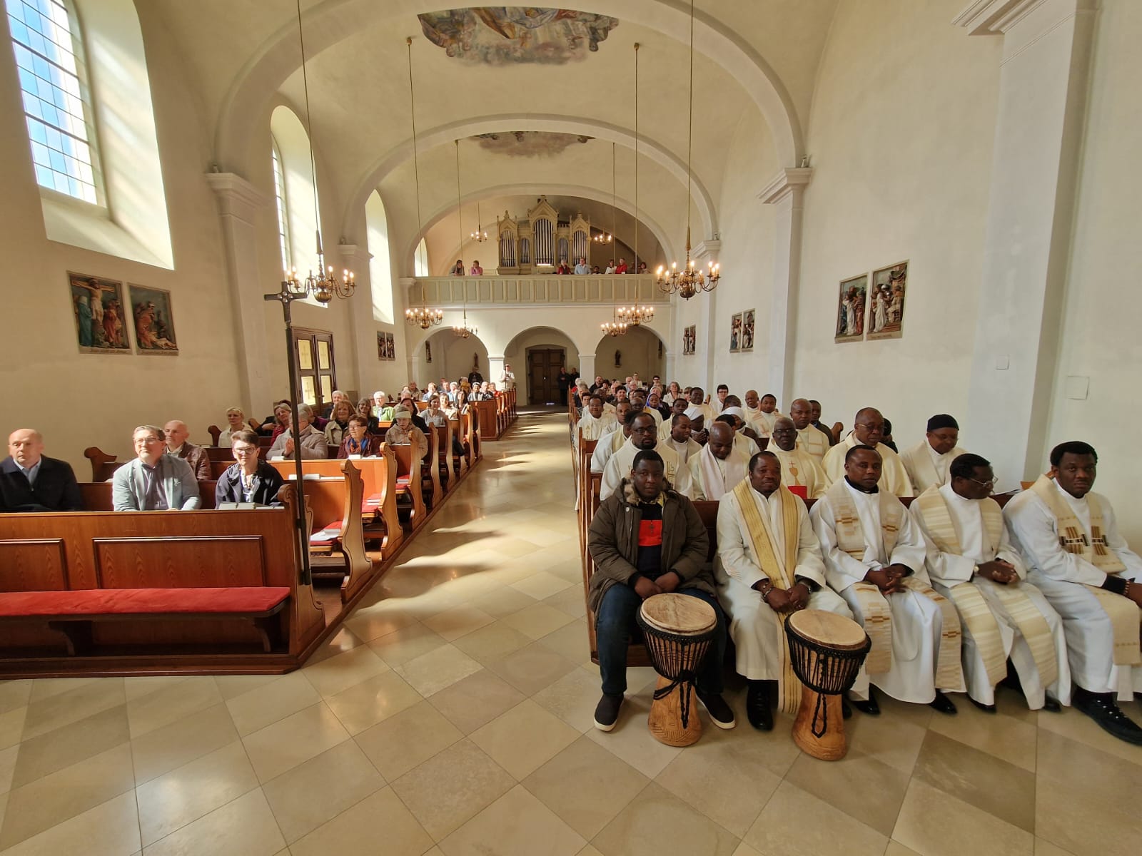 Priests and parishioners gathered in church during the NIPRA Easter Tuesday meeting